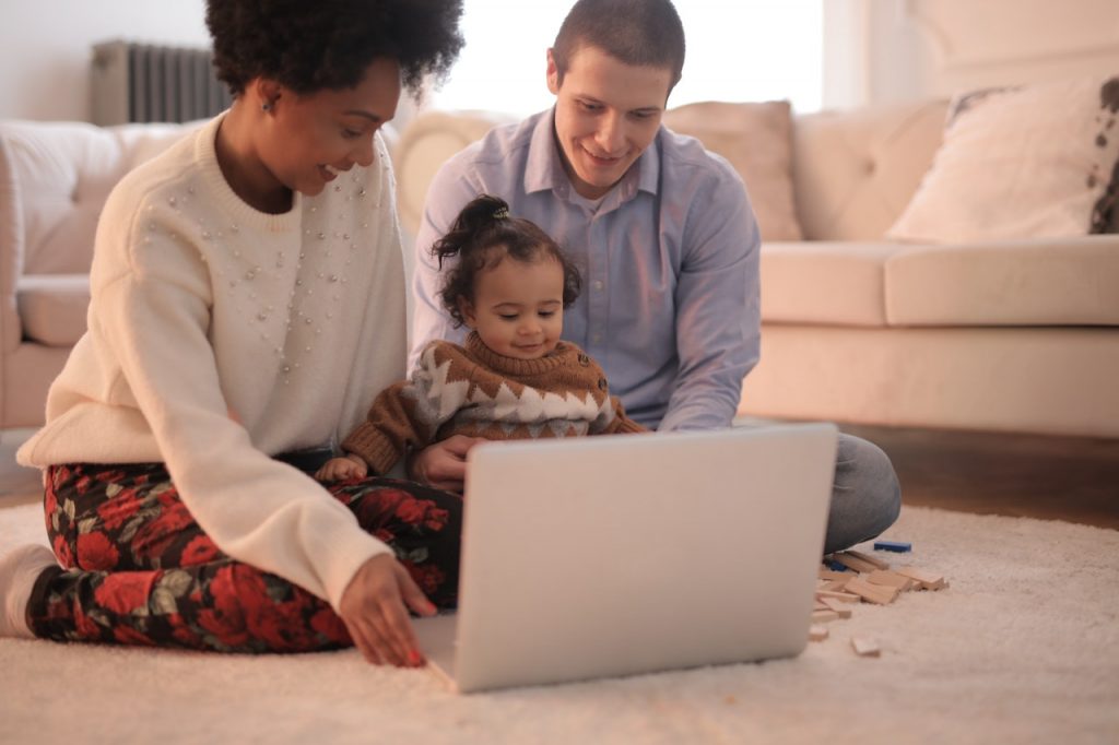 A family using a laptop