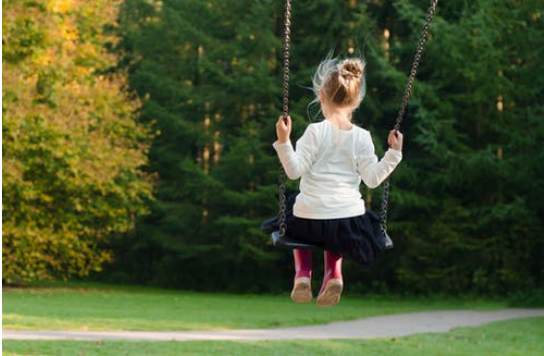 a girl on a swing